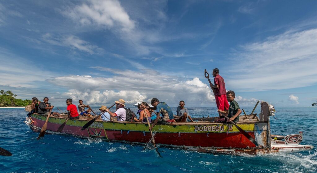 paddle, canoe, travel, rowing, ocean, active, blue, nature, water, clouds, summer, people, lakatoi, action, papua new guinea, blue news, blue new