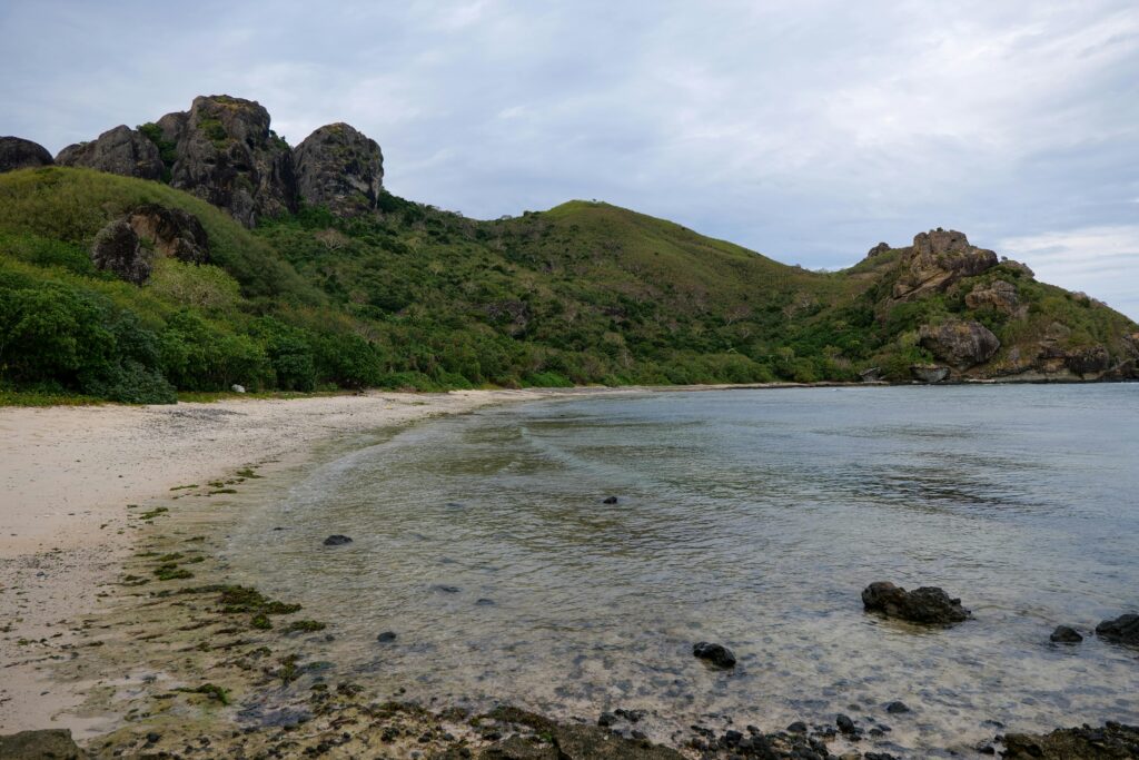 Explore the tranquil beaches of Yasawa Islands, Fiji, with lush landscapes.