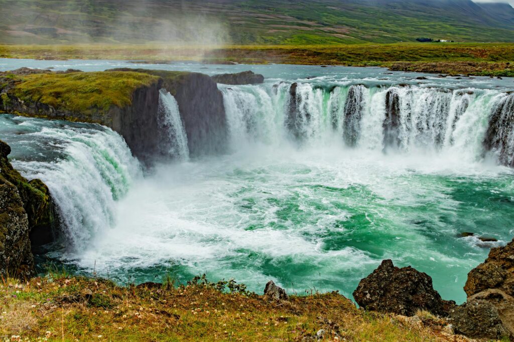 Stunning view of Godafoss waterfall cascading in Iceland